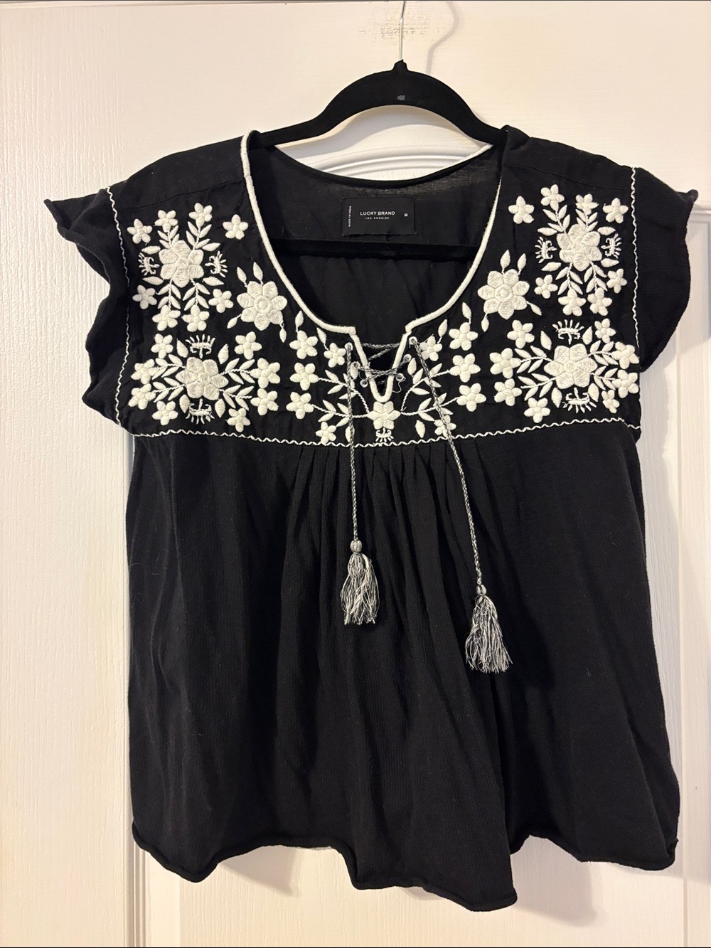 Lucky Brand Black Top with White Floral Embroidery and Tassels